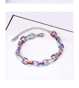 Macro shot of colorful enamel links and stainless steel chain with lobster clasp