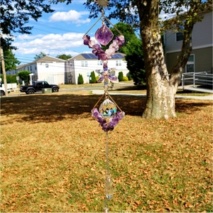 Handmade amethyst crystal suncatcher wind chime with purple stones and golden frame