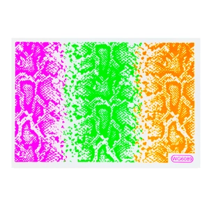 Detailed view of snake skin pattern nail stickers in fluorescent pink green and orange