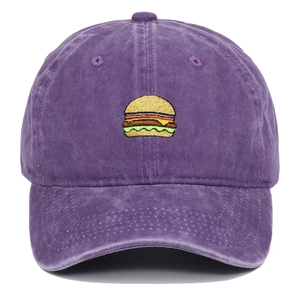 Close-up of burger embroidery detail on purple washed cotton vintage baseball cap
