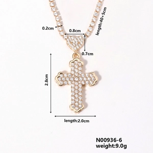 Detailed size specifications for gold cross pendant necklace with sparkling white crystals