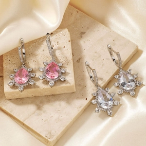 Micro-set teardrop pendant earrings in pink and white crystal with snowflake diamond halo