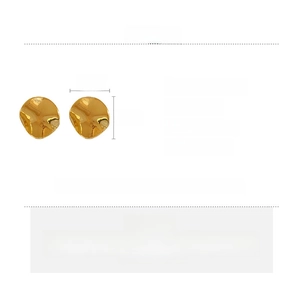 Detailed view of gold plated irregular round earrings with silver needles and 2.6cm size