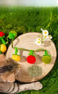 Catnip toy with felt persimmons, built-in bells, and natural wood sticks for cats