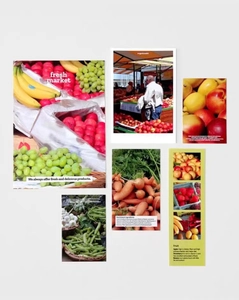 Detail of fresh fruit and vegetable stickers showing nutritional ingredients and market themes