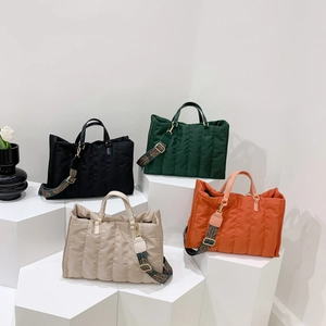 Quilted nylon tote bags in four colors with vintage pattern wide shoulder straps