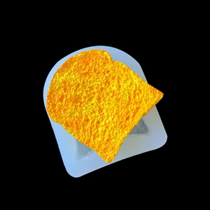 Detailed texture of toast shaped silicone mold with realistic bread crumb patterns