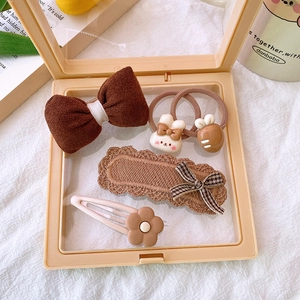 Detailed set of 5 brown fabric hair clips and elastics in a gift box for girls