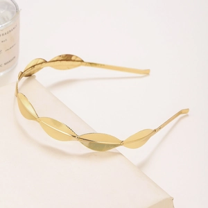 Elegant gold leaf crown headband with detailed metal feather texture and bright finish