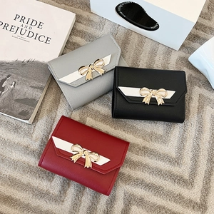 Three colors of elegant women's tri-fold PU leather wallets with gold bow buckles
