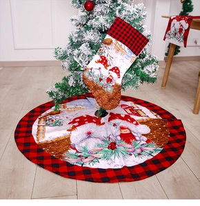Detail of red and black buffalo plaid Christmas tree skirt and matching stocking set