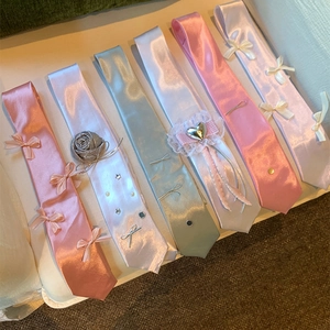 Sweet satin necktie necklaces with bows, hearts, and pearls for a girly look