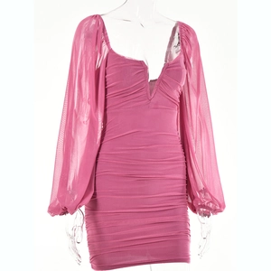 Detail of pink V-neck mini dress with mesh lantern sleeves and ruched bodycon design