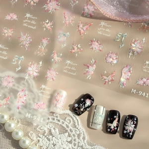 Elegant floral and butterfly nail art stickers with iridescent finish on a lace background
