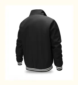 Back view of black bomber jacket with striped ribbed cuffs and hem on plain background