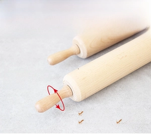 Detail of wooden rolling pins with 360-degree rotating shaft and ergonomic handle