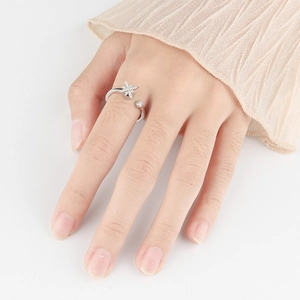 Rotating snowflake fidget ring with silver finish and zircon stones for women