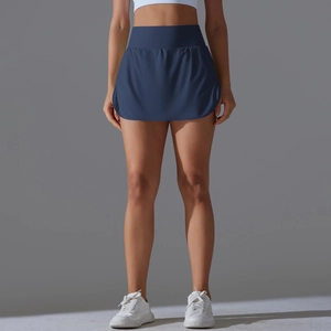 Front view of high waisted navy blue athletic skort featuring a wide waistband and curved hem