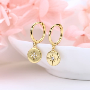 Polished gold S925 sterling silver compass star hoop earrings with sparkling zircon