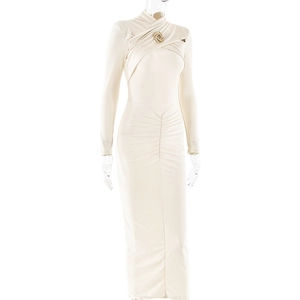Detail of beige long sleeve maxi dress with crossover neckline and ruched waist design