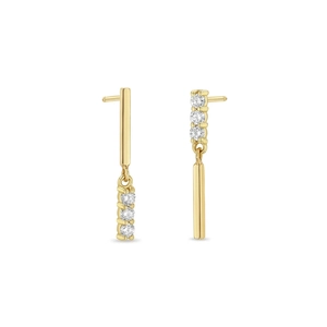 Detailed view of gold S925 silver earrings with three vertical zircon stones