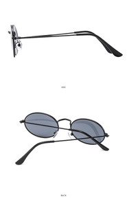Detailed side and back views of vintage oval sunglasses with black metal frames