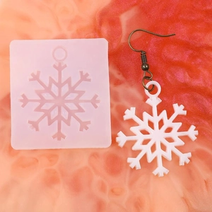Detailed snowflake silicone mold and white snowflake earrings set for DIY jewelry making