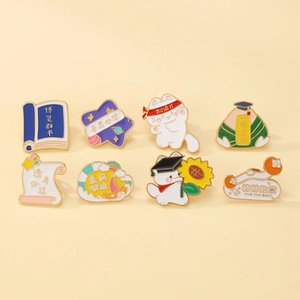 Set of 8 inspirational enamel pins for students with golden metal outlines and motifs