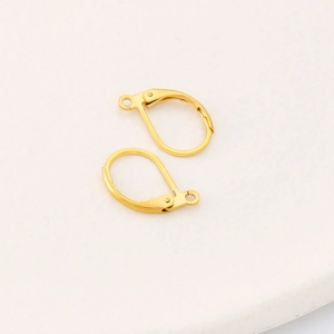 Detail of a pair of gold-plated stainless steel French ear hooks with connector loops