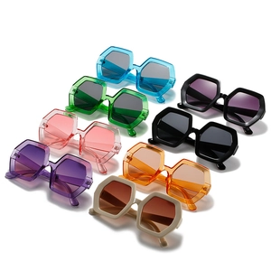 Modern oversized hexagonal sunglasses set in multiple colors with dark UV lenses