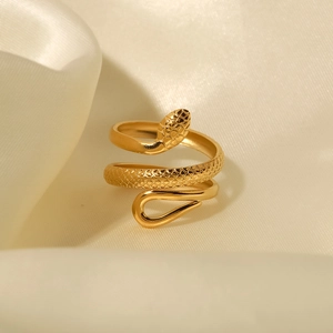 Macro shot of 18K gold plated snake ring showing detailed scale texture on silk