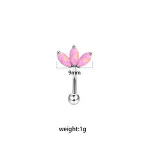 Detail view of 9mm curved stainless steel eyebrow piercing with three pink opal stones
