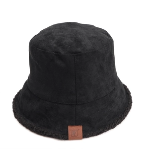 Women's reversible suede and fleece bucket hat in black with a square leather patch