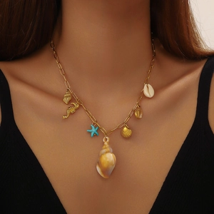 Gold-plated stainless steel chain necklace featuring shell, seahorse, and starfish charms