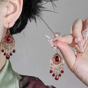 Retro red teardrop filigree earrings with luxury tassel design for ethnic style