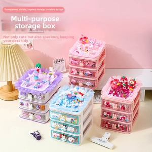 DIY decorative desk organizer with multiple drawers featuring cute cartoon characters