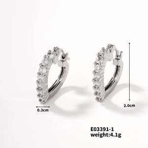Detail view of silver-tone hoop earrings with zircon pavé setting and 2.0cm size measurement