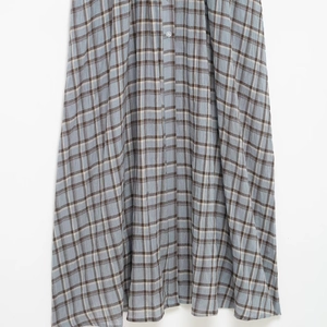 Blue-grey plaid shirt dress featuring button placket detail and classic checkered pattern