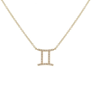 Detailed view of a gold Gemini zodiac necklace set with shimmering pavé zircon stones