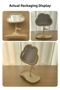 Detail showing cartoon cloud-shaped desktop makeup mirror with pearl frame and base