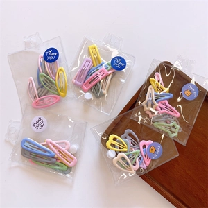 Set of 10 colorful mini hair clips for girls in various macaron shapes and candy colors