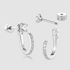 U-shaped stainless steel earrings with micro-inlaid zircon stones on a gray background
