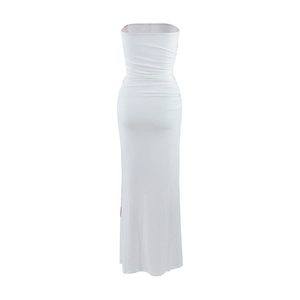Rear view of white strapless slim fit long dress with side gathering and elegant draped fabric