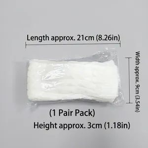Close-up of white cable knit leg warmers with measurements 21x9x3cm for women JK style