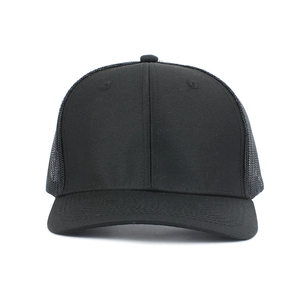 Front view of black trucker hat showing breathable mesh back and curved visor detail