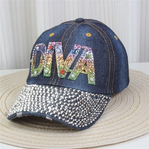 Detail of denim baseball cap with rhinestone brim and DIVA letter pearl embellishment