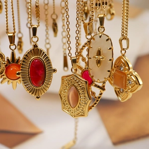Vintage 18K gold plated necklaces with sunburst and natural stone pendants