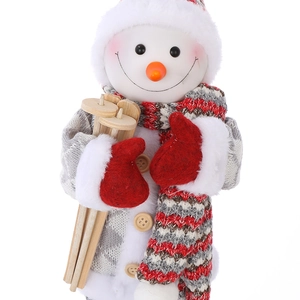 Detail of 30cm snowman figurine with knitted hat, scarf, and wooden skis for Christmas