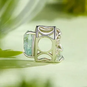925 sterling silver charm bead with rectangular blue gemstone and geometric hollow pattern