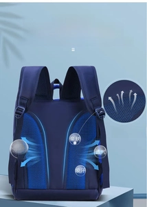 Ergonomic breathable mesh back padding and thick straps on deep blue school backpack